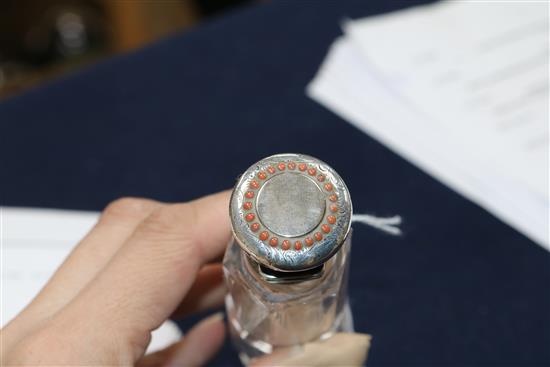 A Victorian double-ended glass scent bottle with makers mark for George Brace, the engraved mounts set with coral beads
